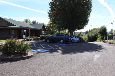 Parking lot at the River House – accessible restroom and parking – road to boat launch